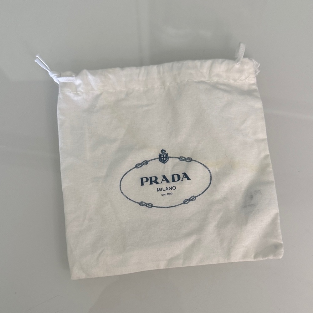 Prada small White Dust Pouch with Navy Logo some discoloration